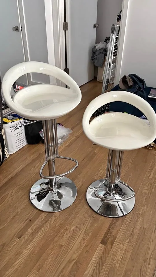 Pair of adjustable height swivel stools