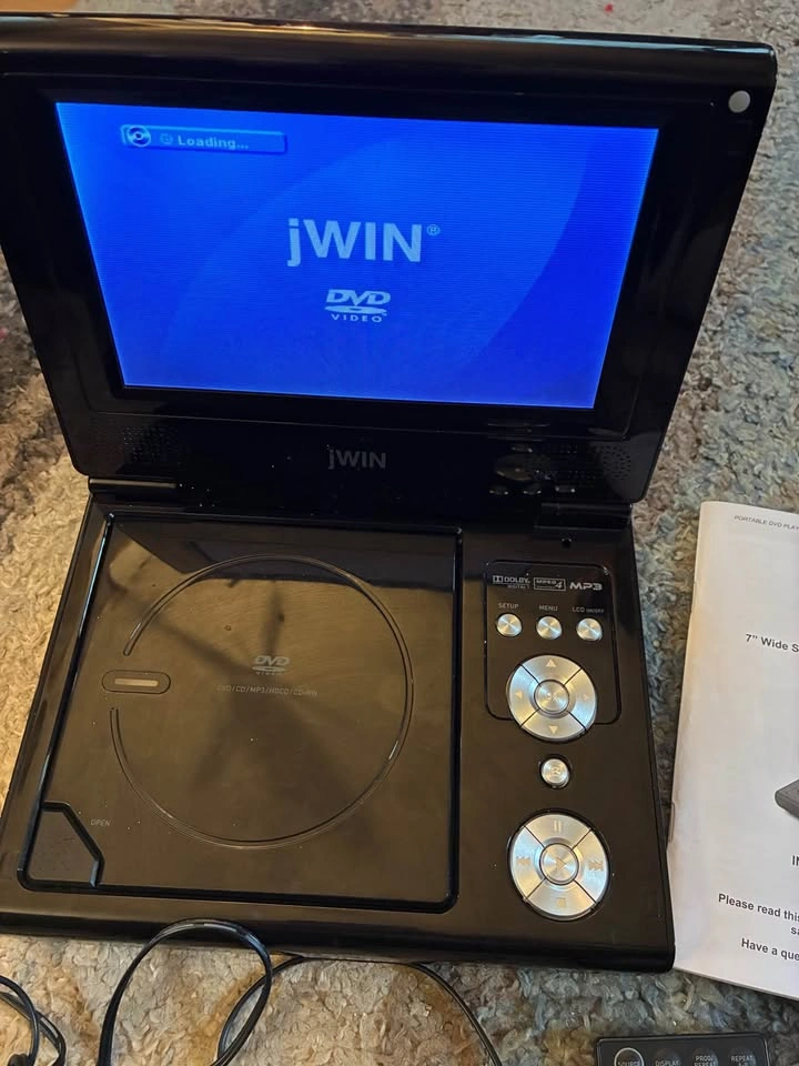 7” Wide Screen Portable DVD Player with Case and 4 DVDs - photo 2