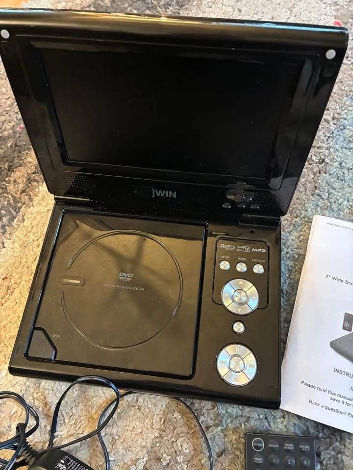 7” Wide Screen Portable DVD Player with Case and 4 DVDs - photo 3