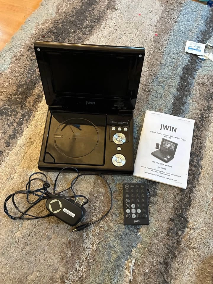 7” Wide Screen Portable DVD Player with Case and 4 DVDs - photo 4