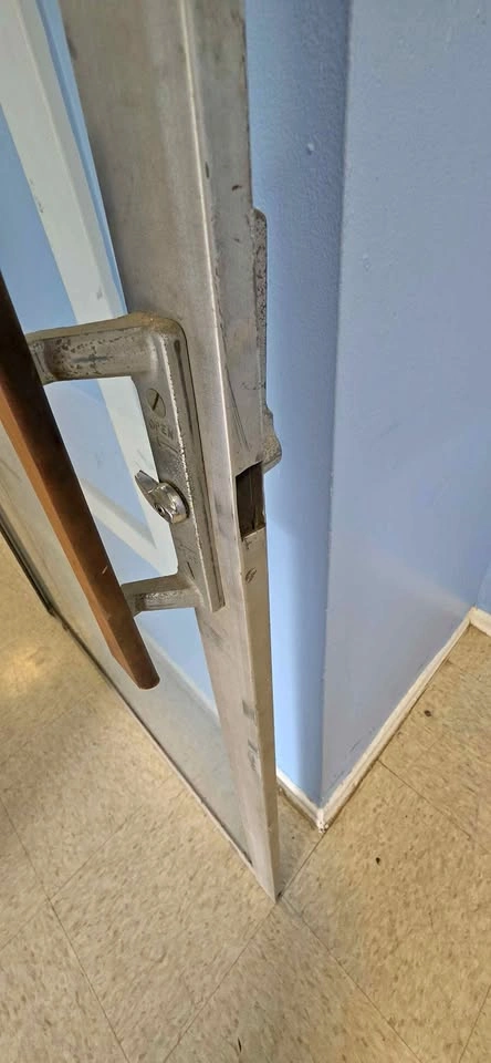 Sliding glass patio door, working lock