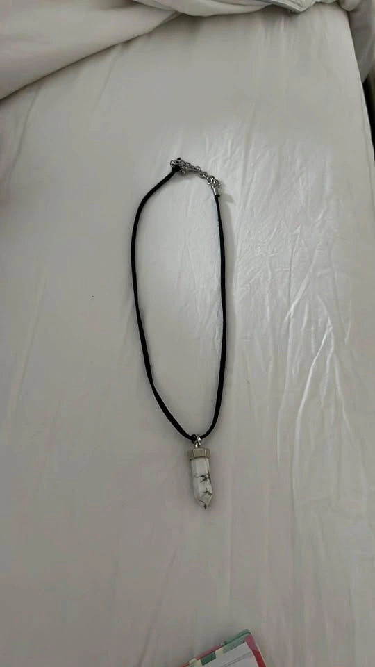 Howlite Crystal point necklace, natural stone on a black cord. - photo 3