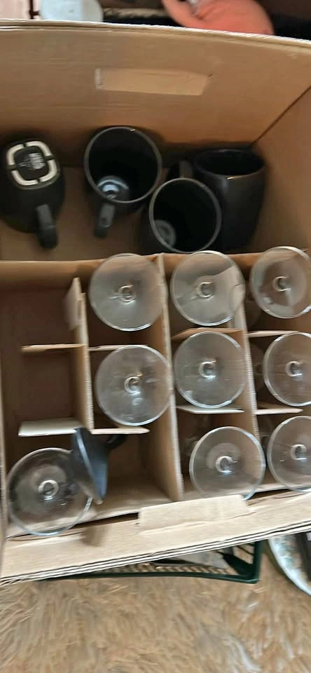 Plates, cutlery, calculator, mugs, glasses