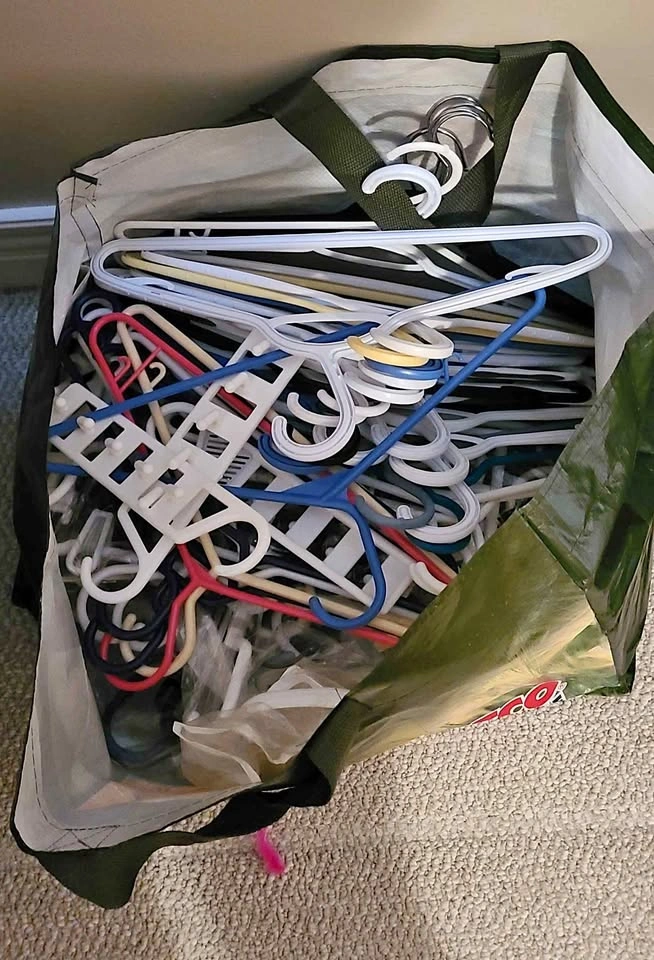 Bag of assorted clothes hangers