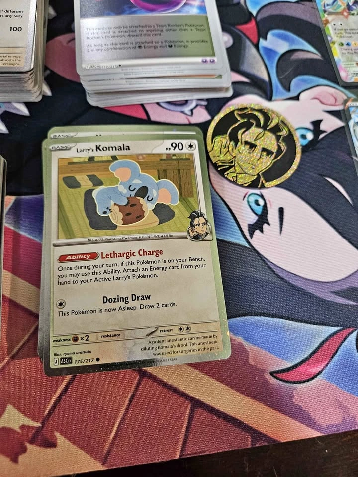 Larry's Komala 175/217 Holo Ascended Hero Coin+