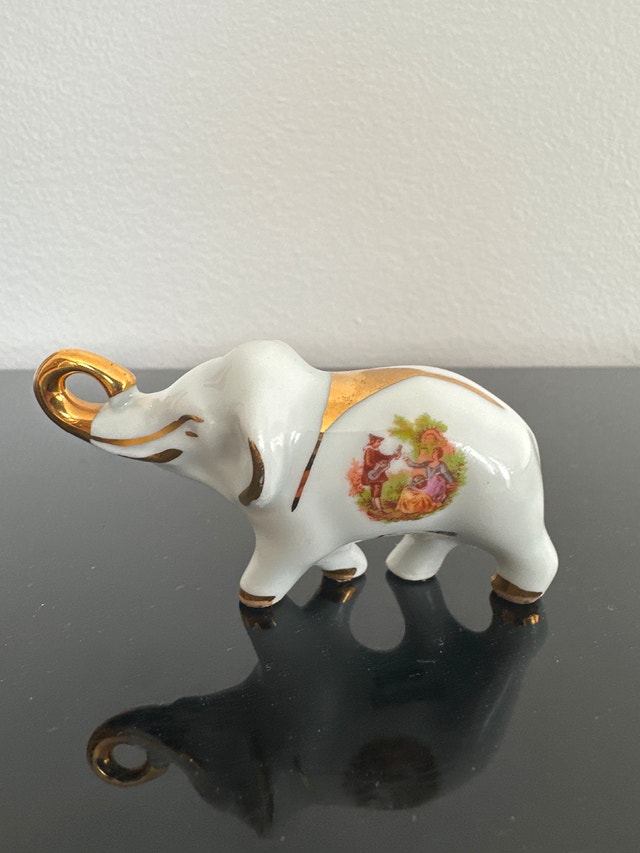Limoges vintage porcelain miniature elephant figurine.