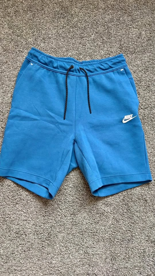 Blue Nike Tech Shorts (Size Small)