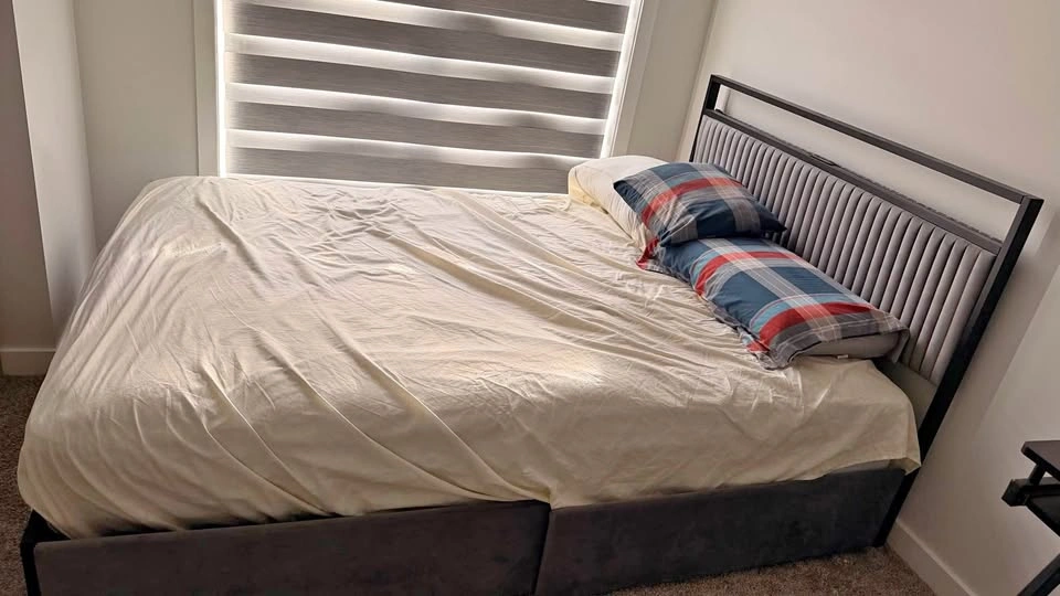 Bed frame with headboard and mattress