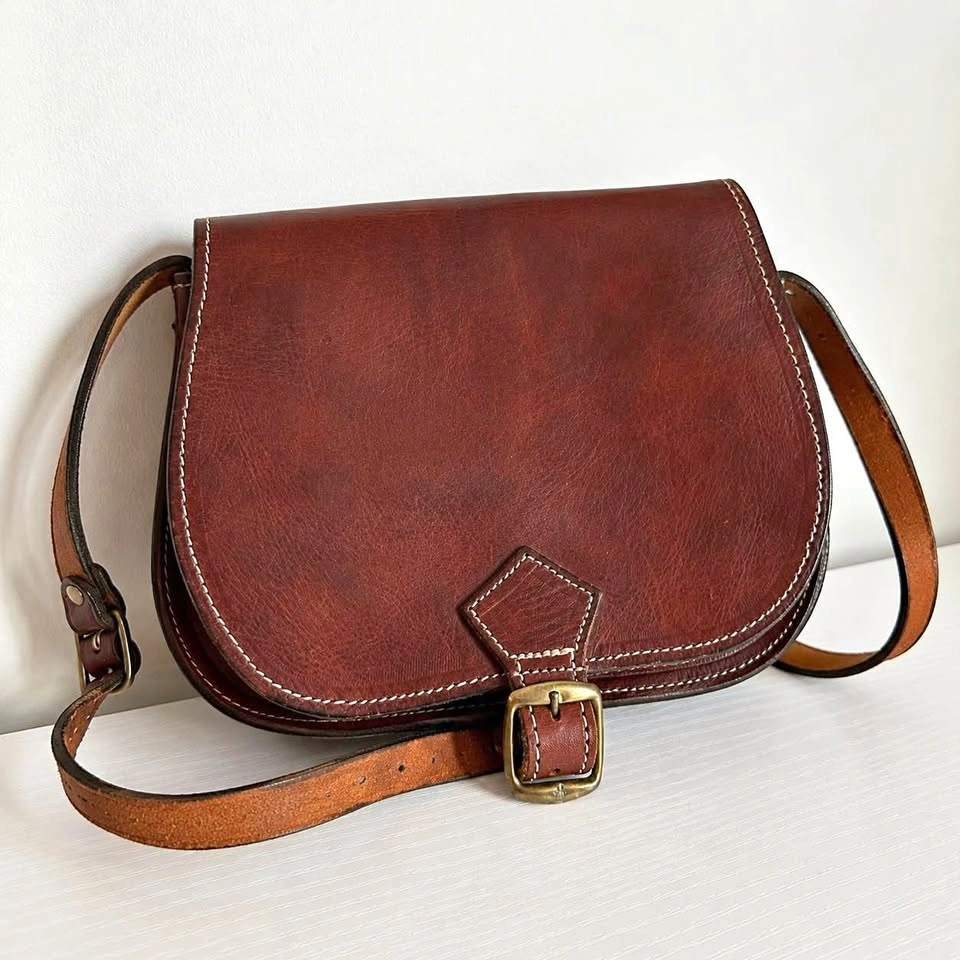 Brown leather crossbody saddle bag