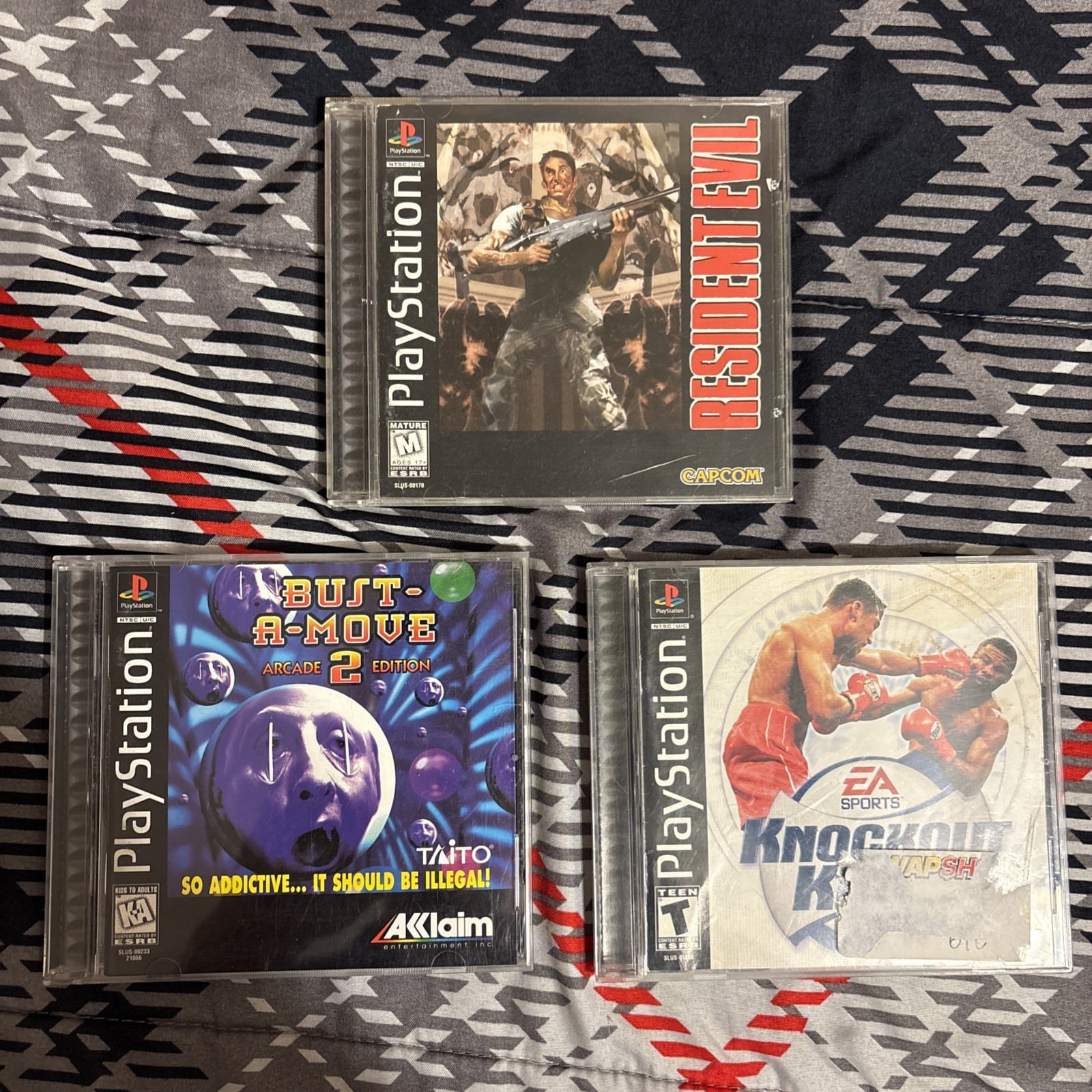 Lot Of 3 PS1 Games: Resident Evil, Knockout Kings 01, Bust A Mov