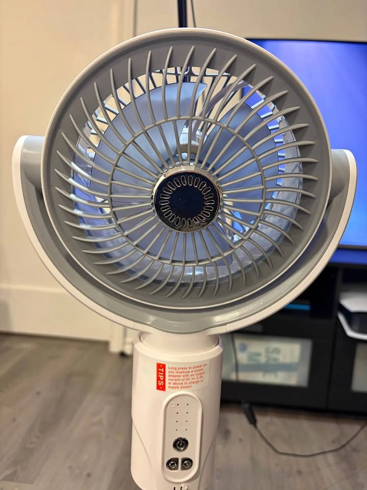 White DREO standing fan