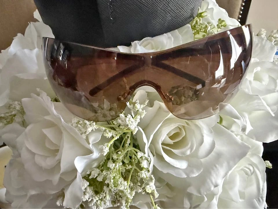 Prada Sunglasses - Rimless Brown Lens with Gold Accents
