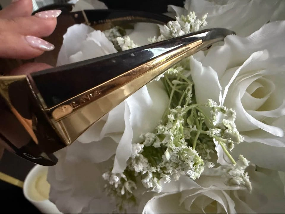 Prada Sunglasses - Rimless Brown Lens with Gold Accents - photo 2