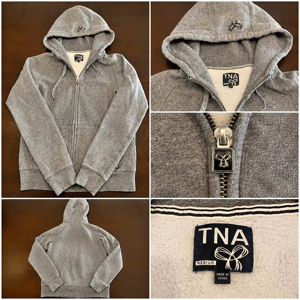 TNA zip up hoodie medium