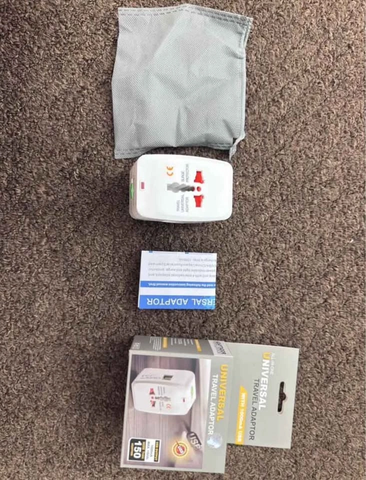 Universal Travel Adaptor with USB - photo 3