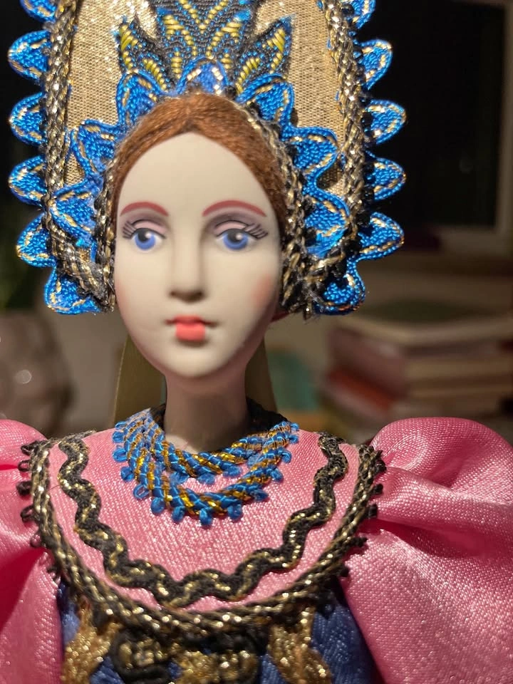 Porcelain handpainted doll