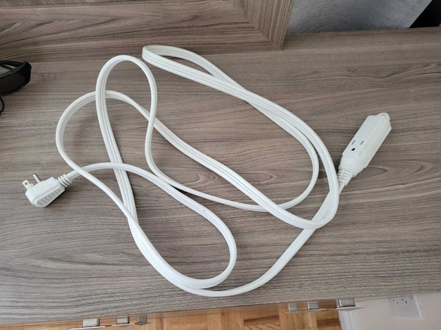 Used White Extension Cord with 3 Outlets