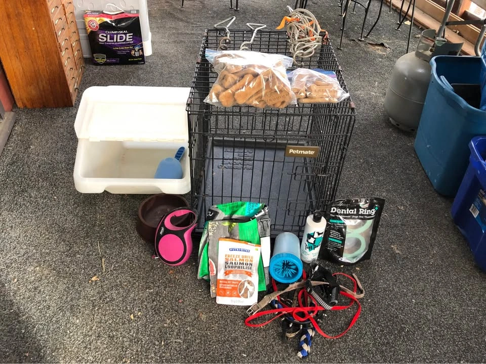 Dog cage, food container, and supplies - photo 2