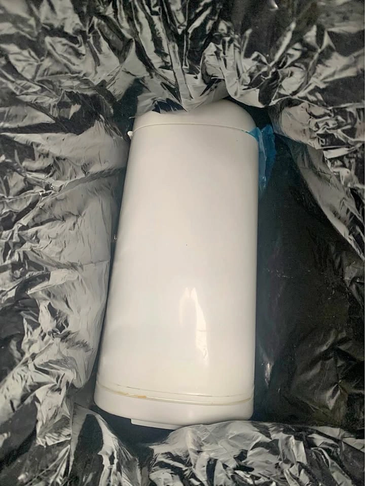 Diaper Genie and 5 rolls of bags