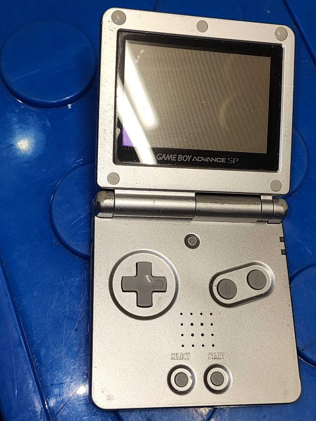 Gameboy Advance with Pokemon Red and Super Mario World