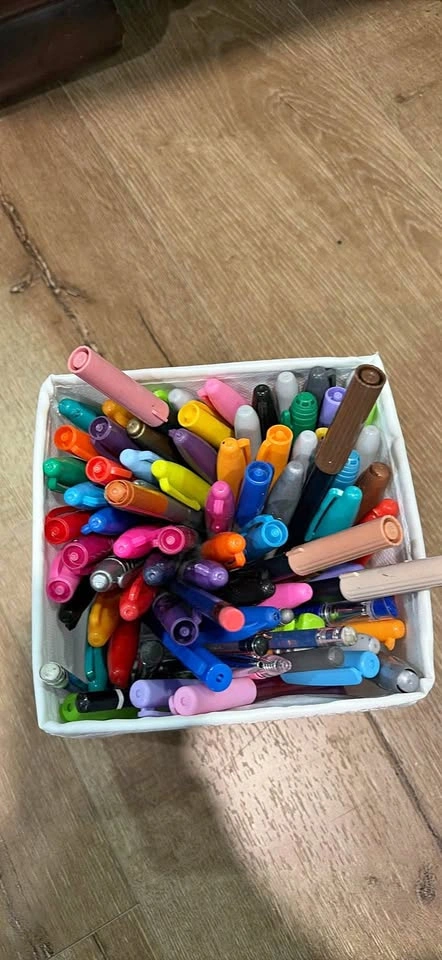 Art supplies: Sharpies, markers, pencils, pens
