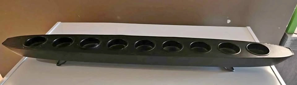Long black candle holder
