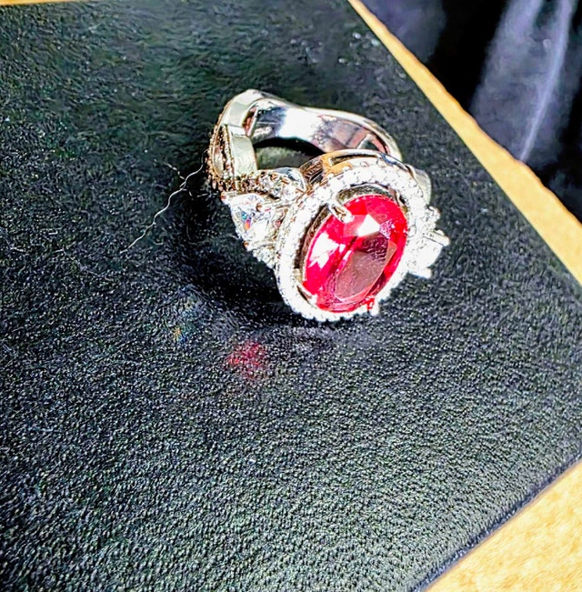 Unique beautiful ring with cute heart accents on the side