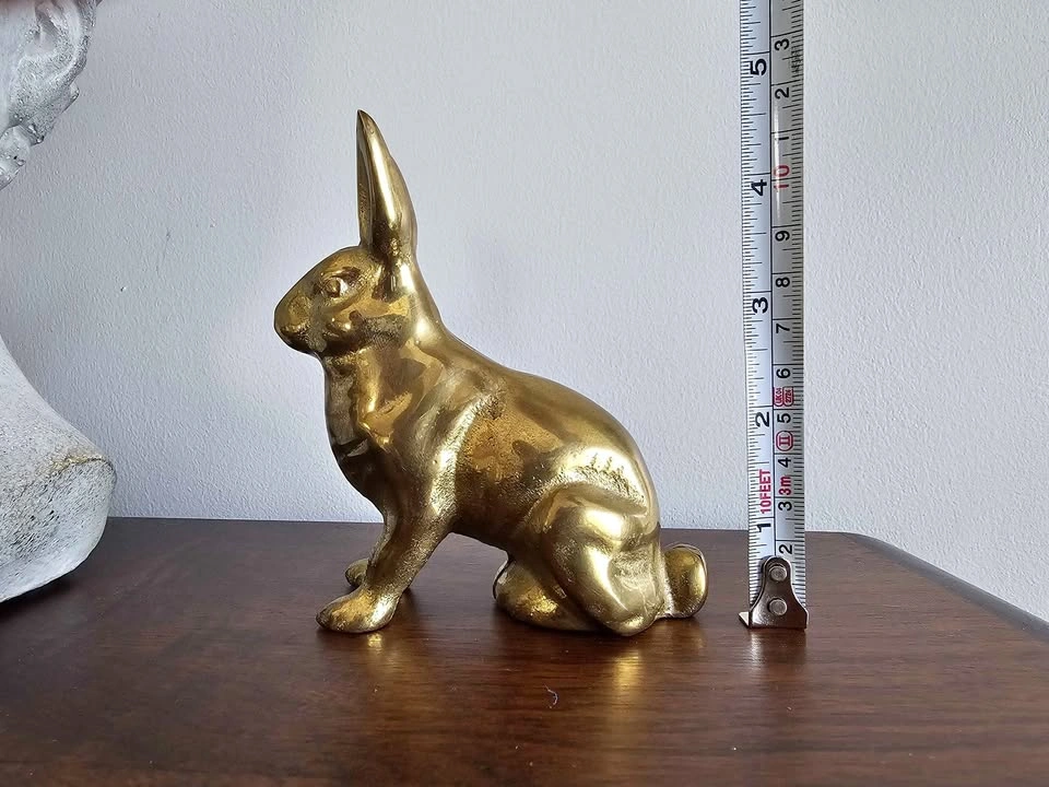 Vintage brass bunny coin bank