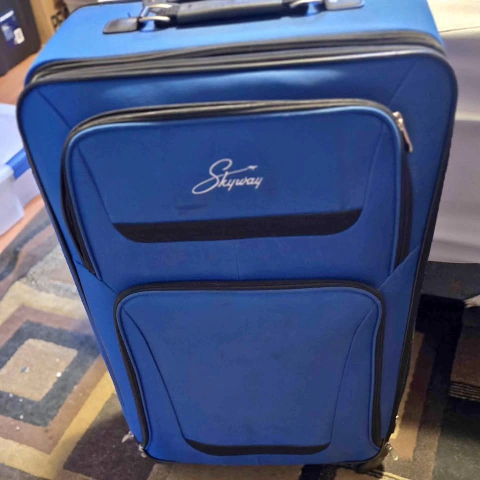 3 piece Skyway Blue Rolling Luggage Set