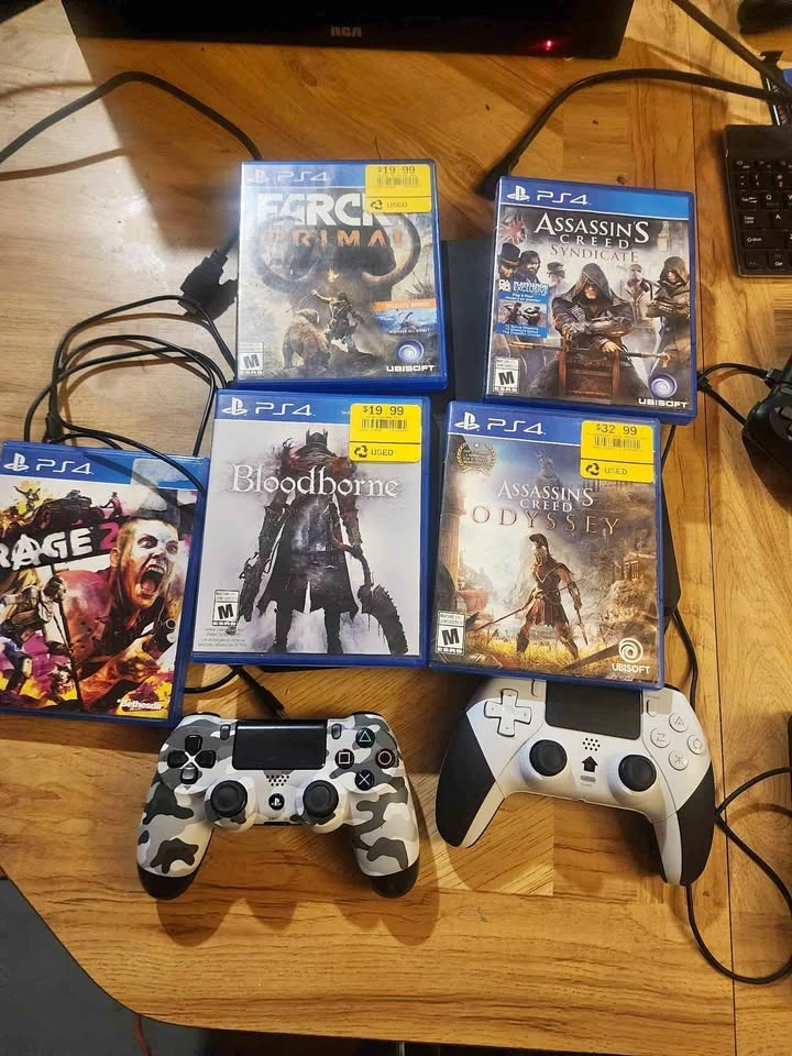 PS4 1TB Console with 2 Controllers and 5 Games