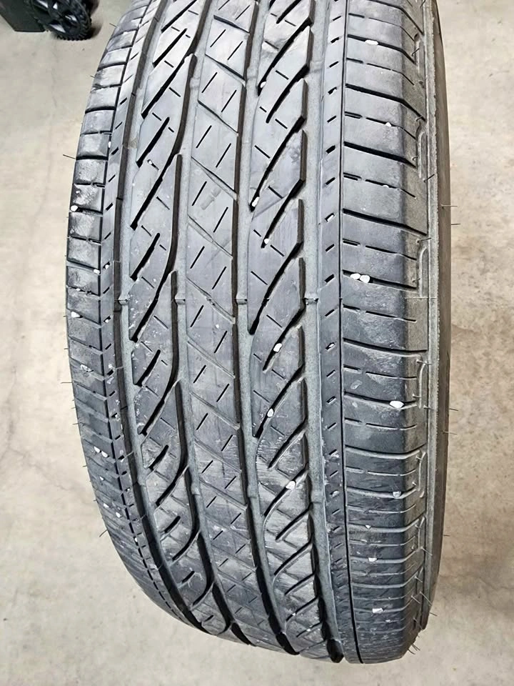 1 Bridgestone 245/60R18 All Season Tire