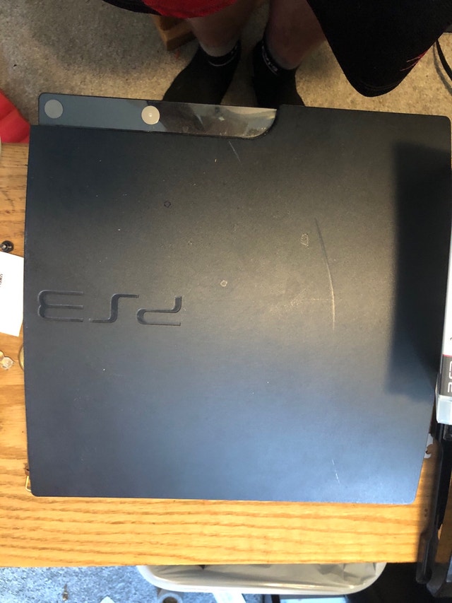 PS3 with Games and Controllers