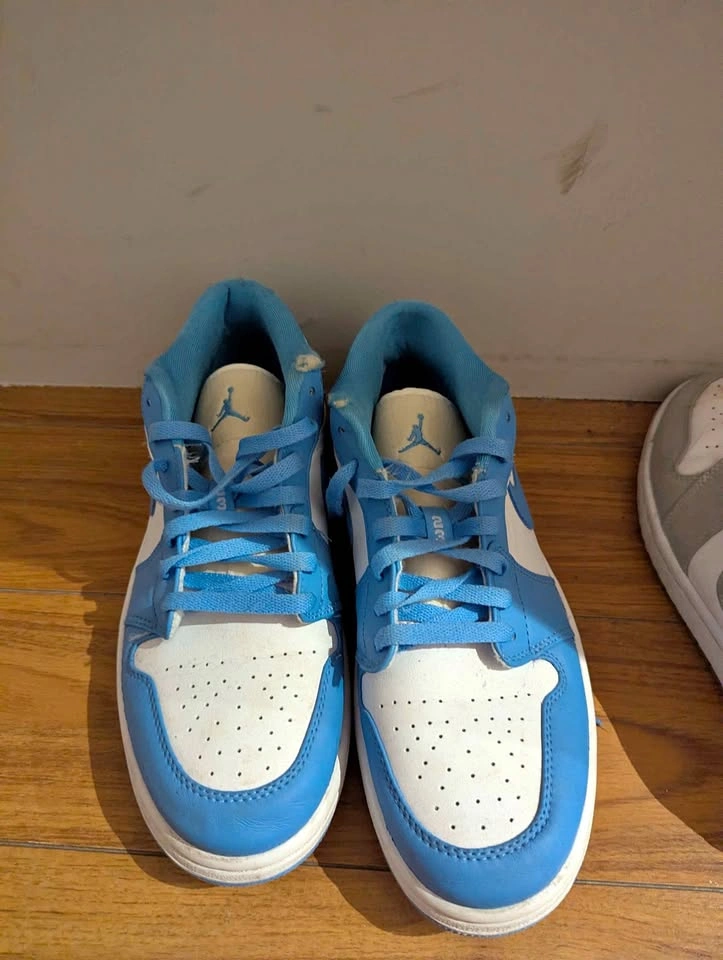 Jordan 1 Low blue and white sneakers