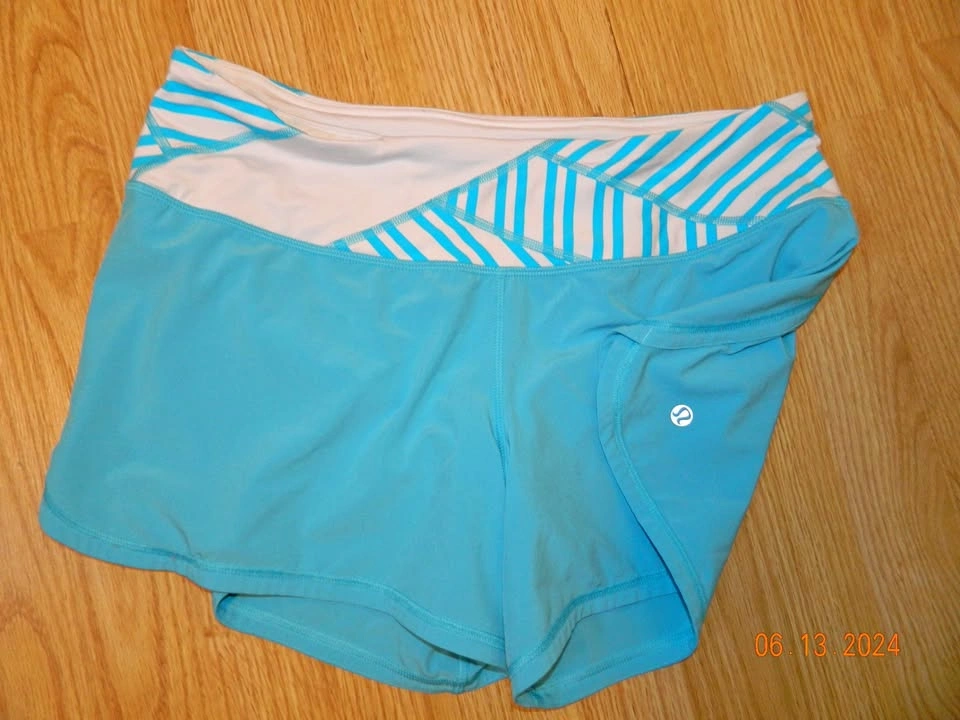LULULEMON GROOVY RUN SHORTS..4"..size 8..EUC