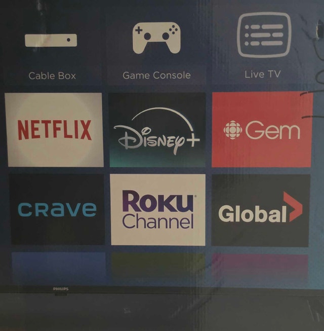 BRAND NEW 50 inch Roku Smart TV - photo 2
