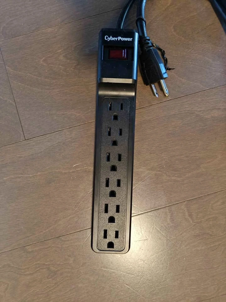 Brand New 6 Outlet Surge Protector - 12ft Cord