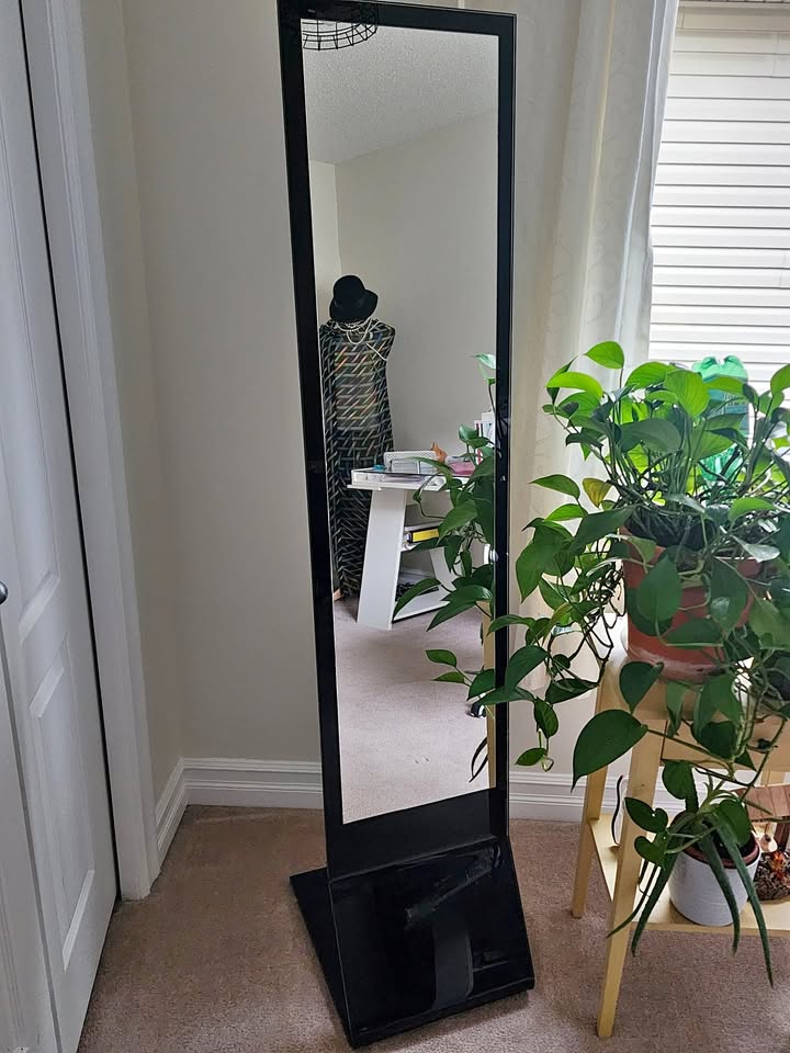 Standing Mirror made of black thin and heavy glass