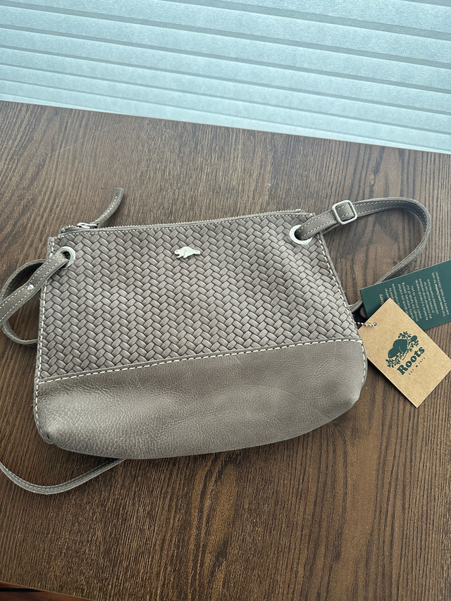 BRAND NEW - Roots Leather Bag