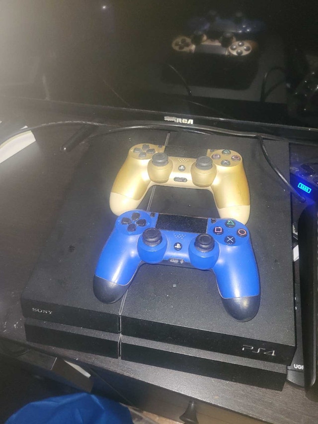 PlayStation 4 with Games and 2 Controllers