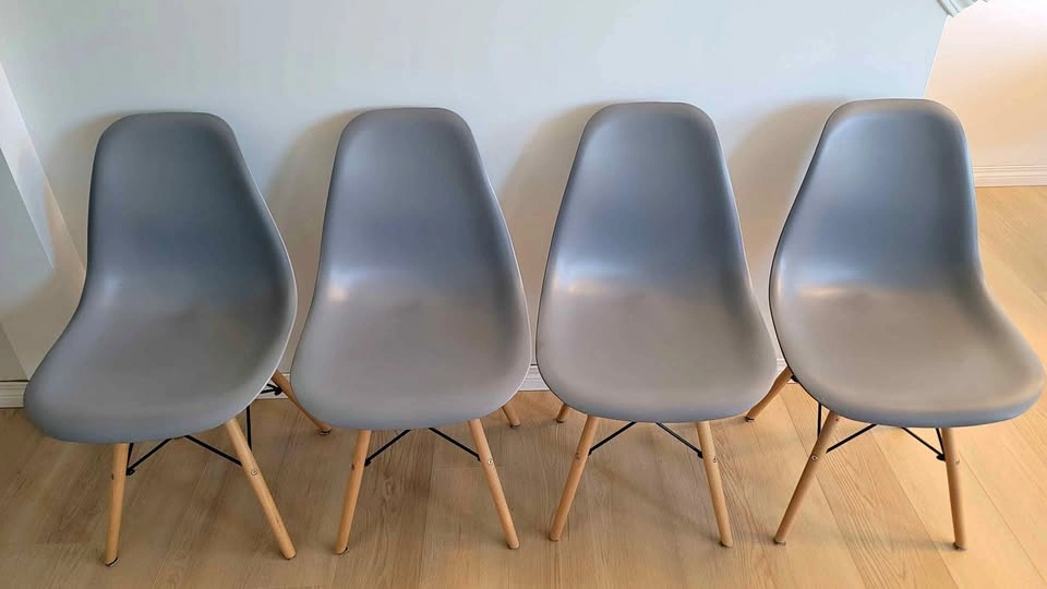 4 Grey Eames-Style Dining Chairs