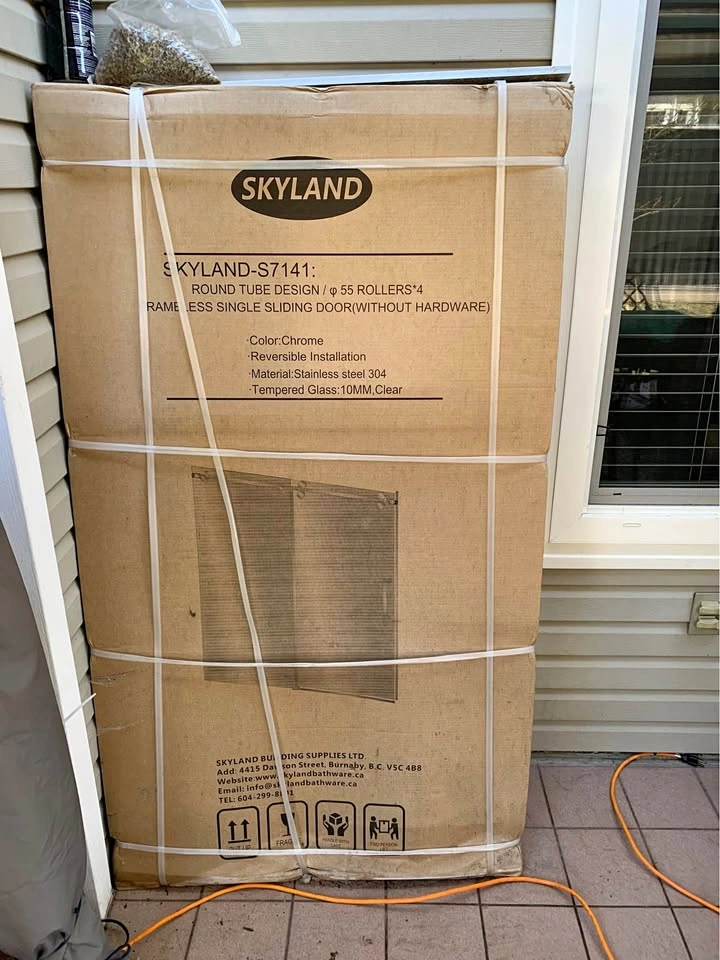 New in box Shower doors