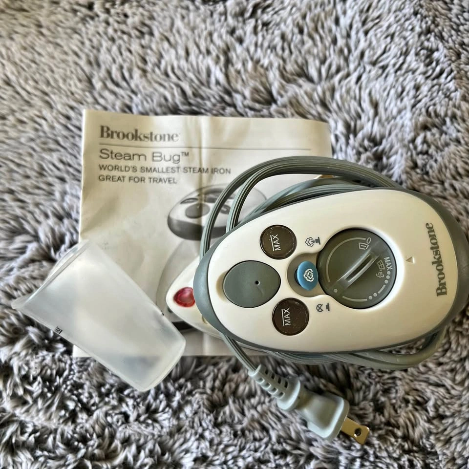 Brookstone Steam Bug Dual Voltage Travel Iron: never used
