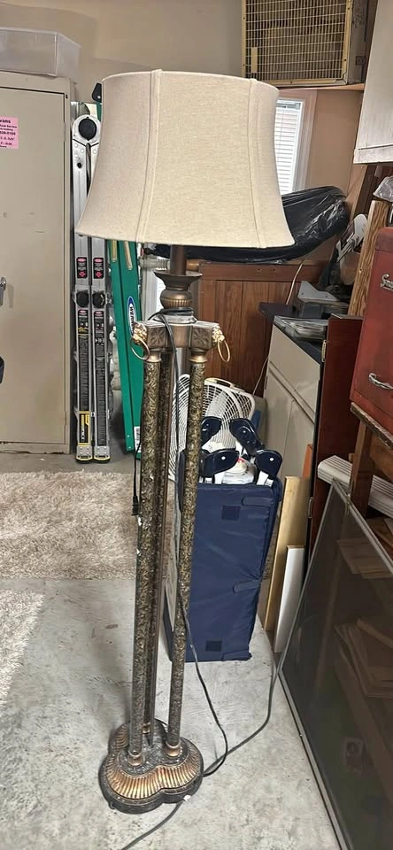 Tall solid metal lamp