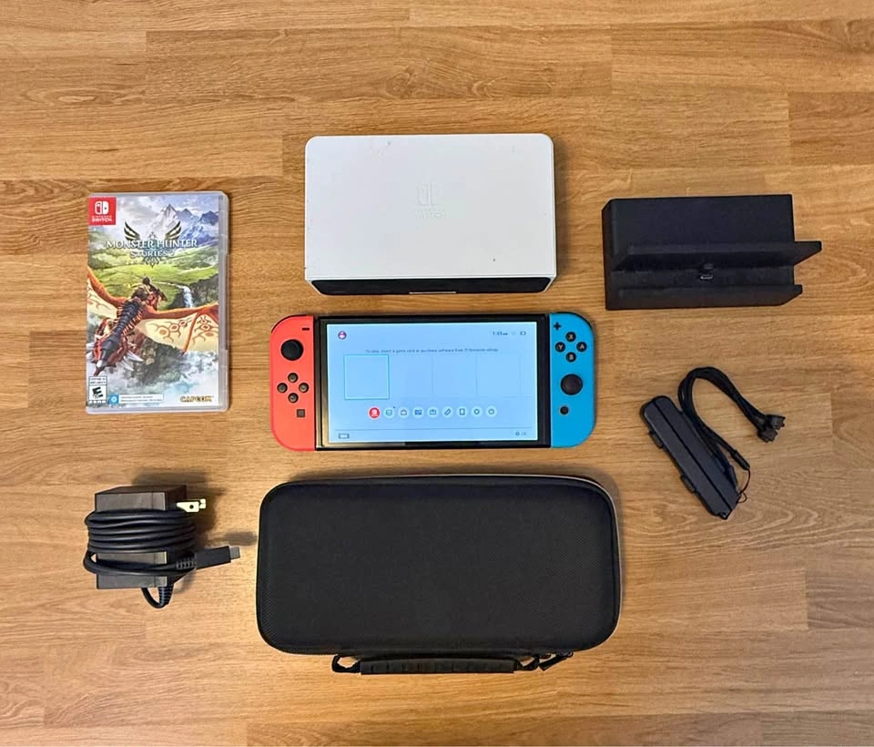 Nintendo Switch OLED Bundle w/ 2 Docks & Monster Hunter