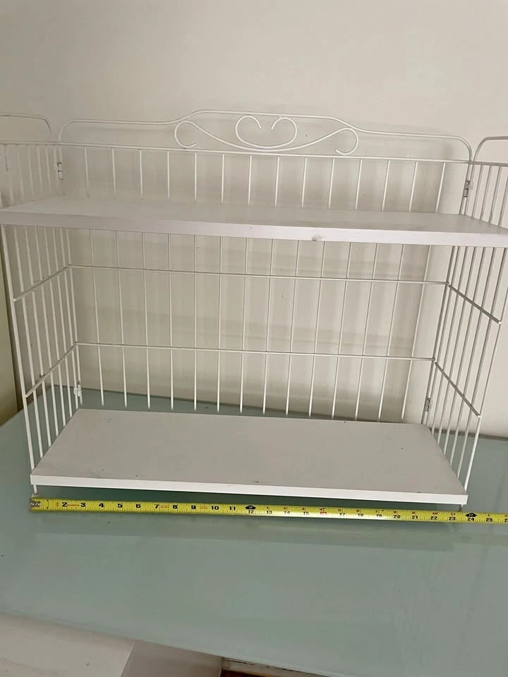 Metal display rack with wood shelves