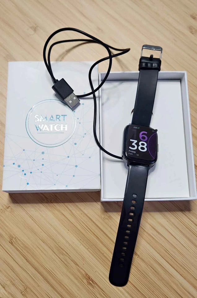 Used Black Smartwatch with Charger (Band Ripped)