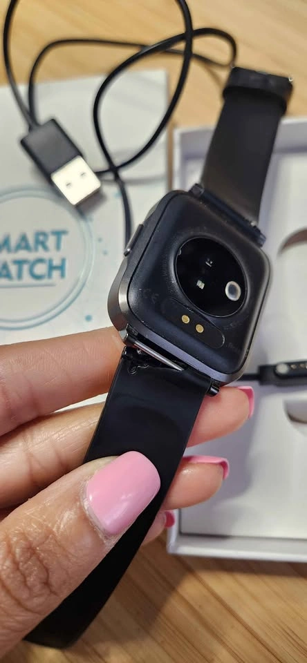 Used Black Smartwatch with Charger (Band Ripped) - photo 2