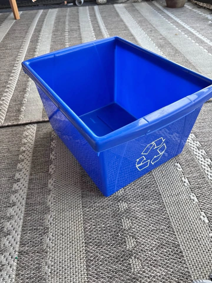 Blue recycling bin