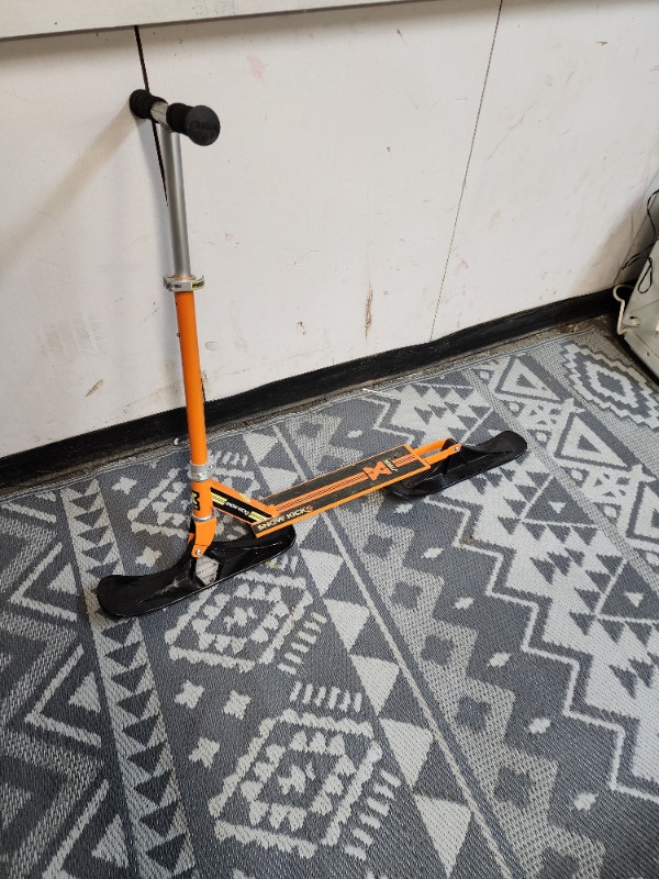 Orange Snow Scooter Downhill Slider