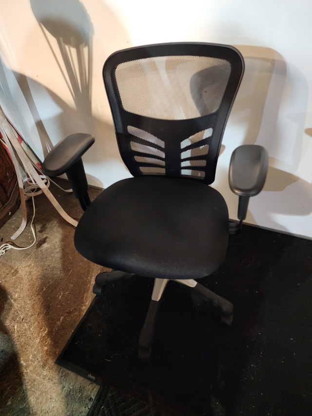 Black cloth office chair cooling reclining back rolling tilt